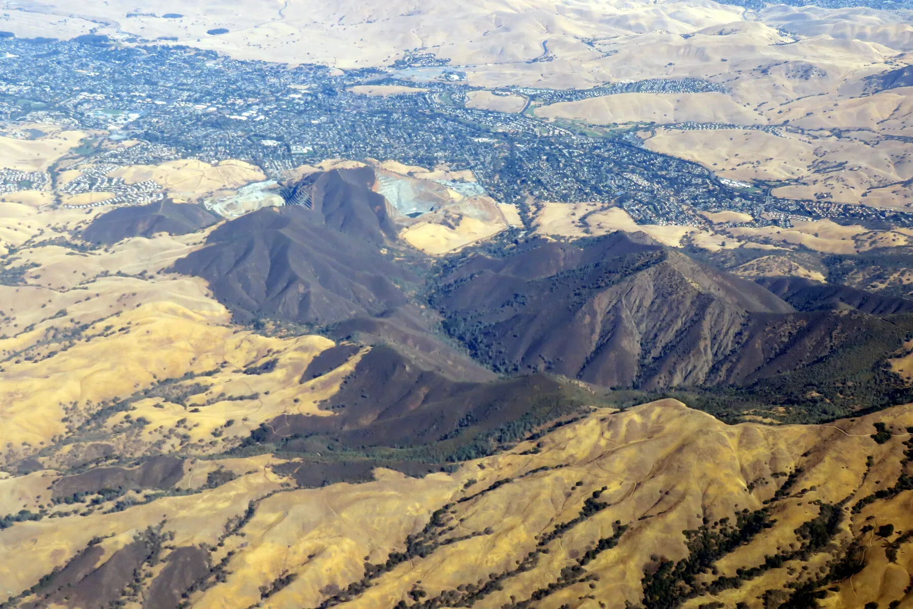 The northwest foothills of Mount Diablo from the air, ridges running down into the valley.